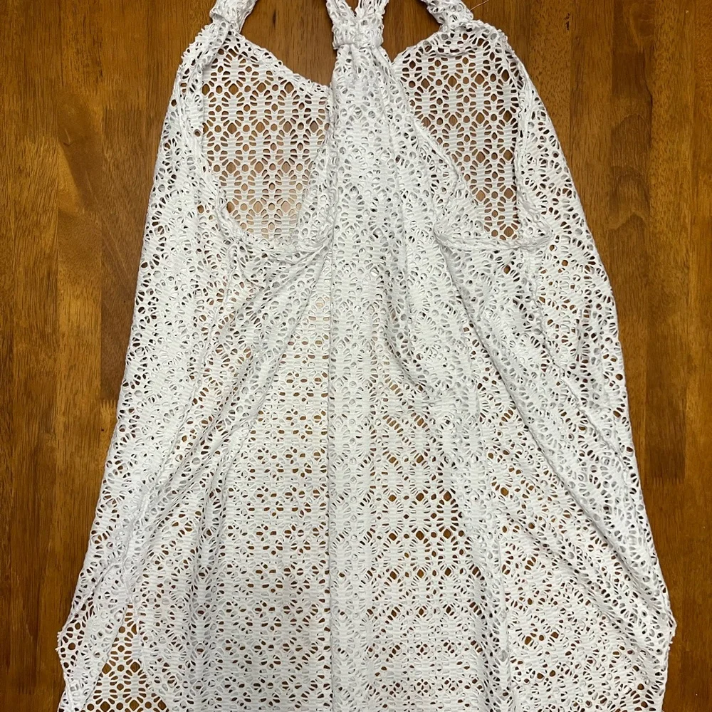EUC swim coverup with adjustable straps and back. Excellent condition.